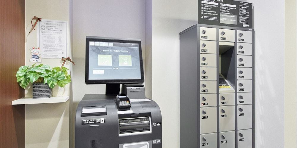 チェックイン / チェックアウト キオスク