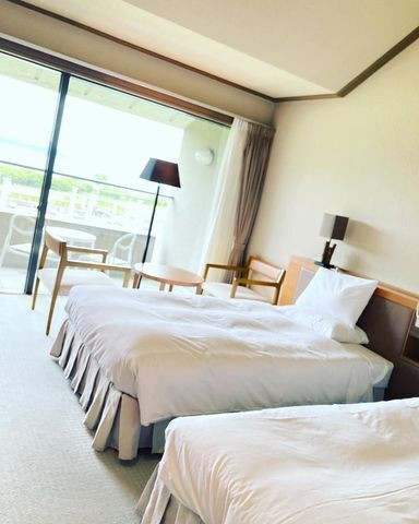 エキストラベッドを入れると最大3名まで利用できるツインルーム / 1