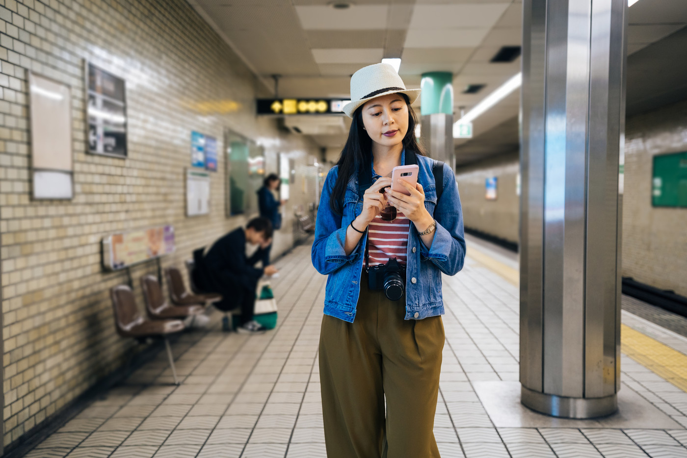 tourist walking underground the railway station