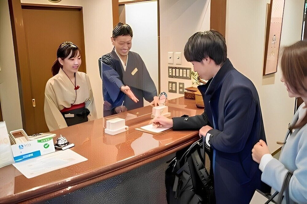 チェックイン / チェックアウト キオスク