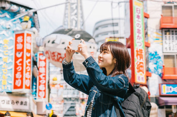 A woman sightseeing in Osaka