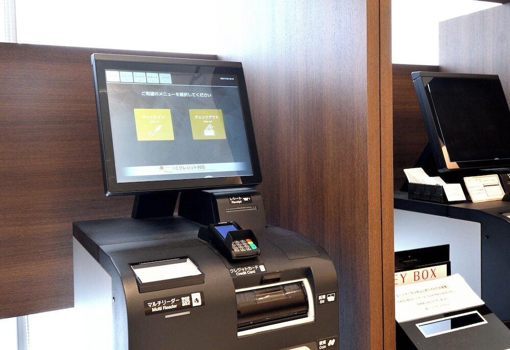 チェックイン / チェックアウト キオスク