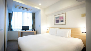 スイートルーム キングベッド 1 台 禁煙(3名利用の場合、エキストラベッド付)