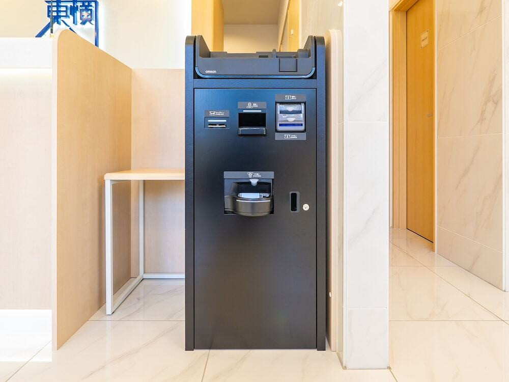 チェックイン / チェックアウト キオスク