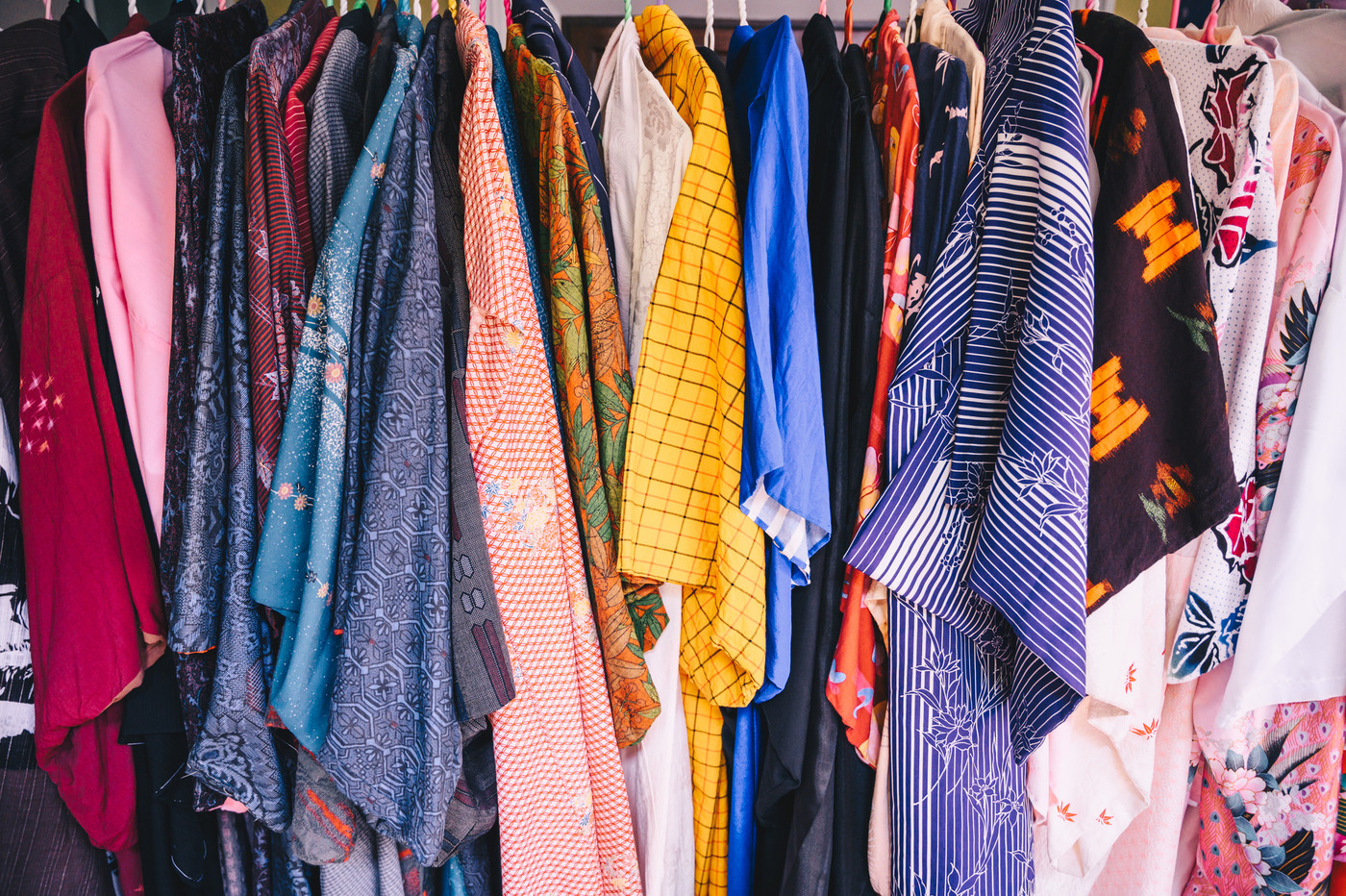 Group of Japanese "Yukata" hanging on the rack in store. A Japanese yukata is a lightweight form of kimono, which is worn casually during the summer.