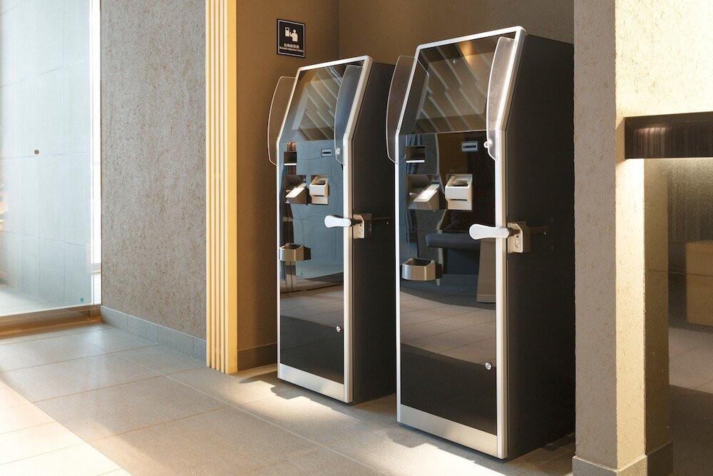 チェックイン / チェックアウト キオスク