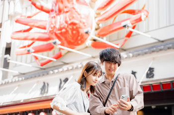 Couple sightseeing in Shinsaibashi, Osaka