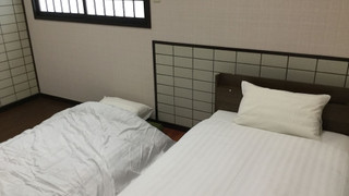 アウトバスツインルーム（ベッド1台ソファベッド1台・風呂なし・近隣の温泉チケット付き）