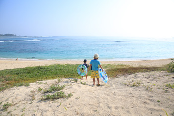 child heading to the sea