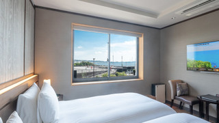 スタンダード ルーム シングルベッド 2 台 禁煙 パーシャル オーシャン ビュー