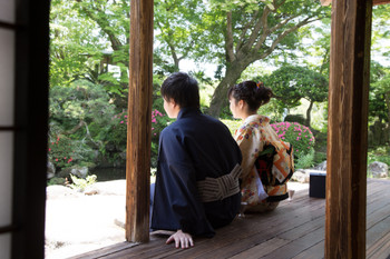 Two people looking at the garden at the Ohara residence